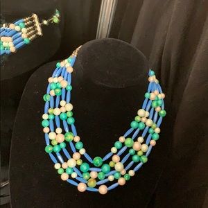 Costume jewelry 5 strands colored beads adjustable